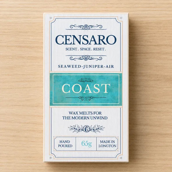 Censaro Coast handmade wax melts with vintage-style packaging on a wooden surface