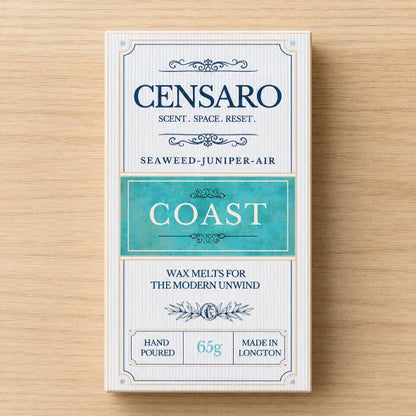 Censaro Coast handmade wax melts with vintage-style packaging on a wooden surface