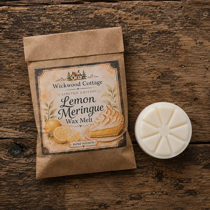 Wickwood Cottage Lemon Meringue Wax Melt packaging and lemon slice wax melt displayed on a rustic wooden surface.