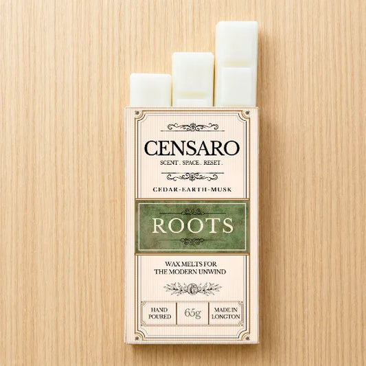 Censaro Roots packaging with 3 wax melts on a wooden surface