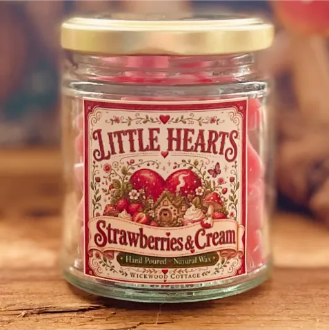 Jar of Wickwood Cottage Little Hearts Strawberries and Cream wax melts with pink heart-shaped melts inside and a whimsical vintage-style label.